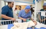 بأمر الملك سلمان وولي العهد.. بدء عملية جراحية معقدة لفصل توأم طفيلي عن رضيع مصري بالرياض